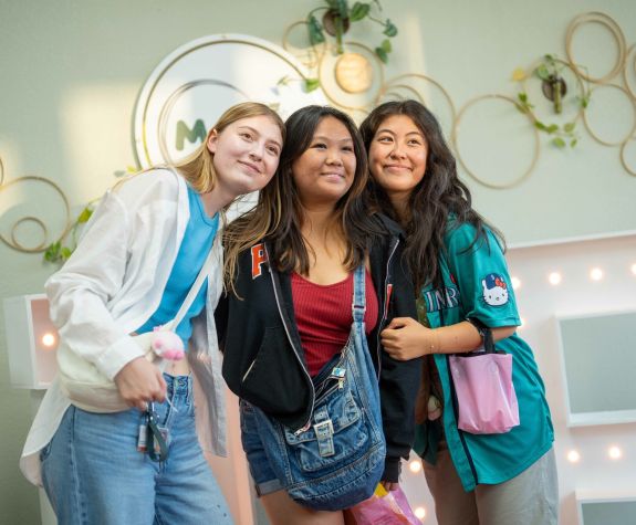 three students posing for a photo