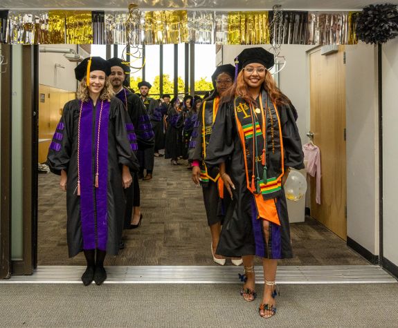 graduates standing in two lines