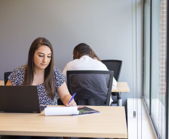 student working at laptop