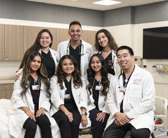 nursing students in white coats