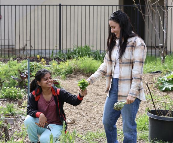 Pacific nutrition students in a vegetable garden