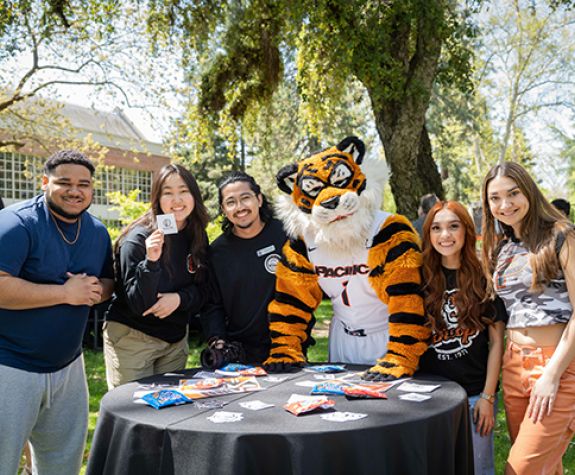 Students with Powercat, the University mascot