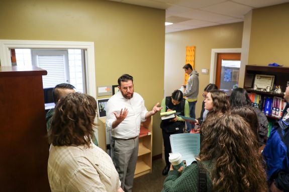 Man speaks to students 