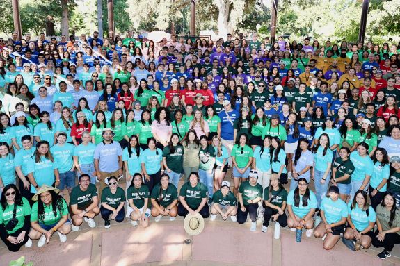 Photo is from SHS Day in 2024 and shows the assembled staff, faculty, and students from the ten programs at the School of Health Sciences