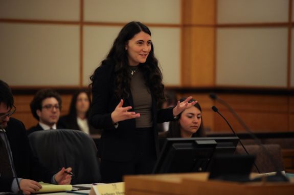 Speaker engaging with students.