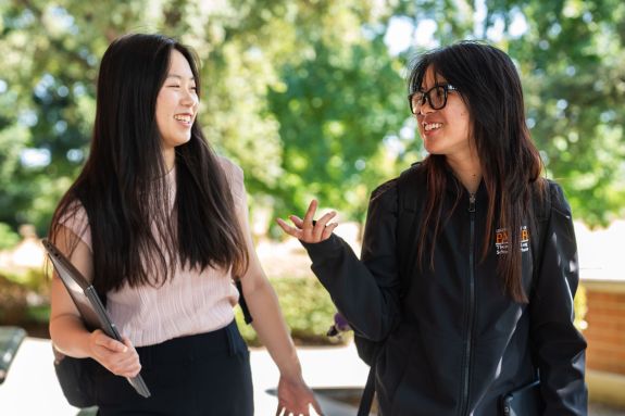 Two PharmD students on campus
