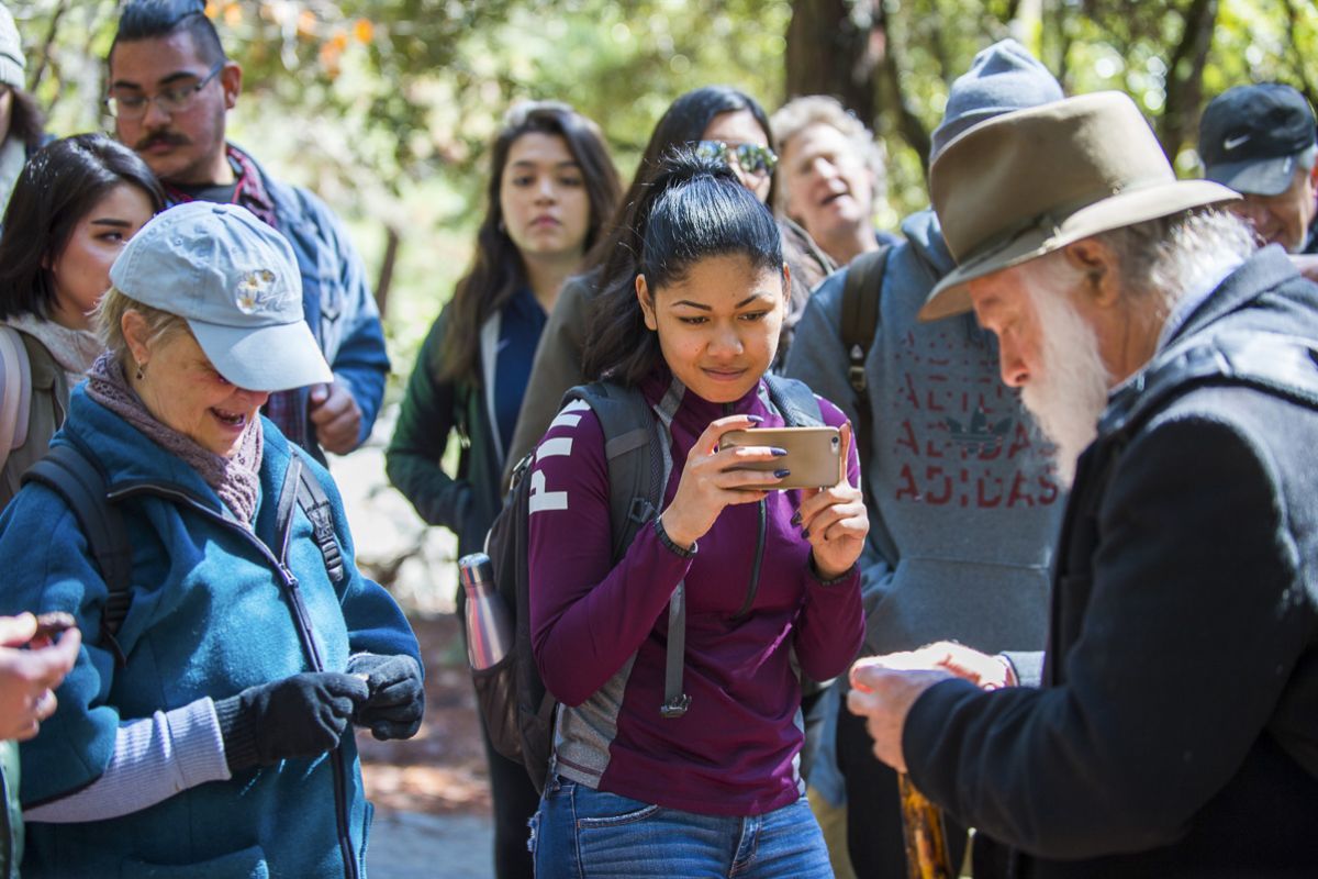 History student listens to John Muir impersonator