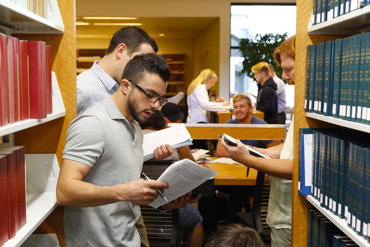 gls students talking in the legal studies center
