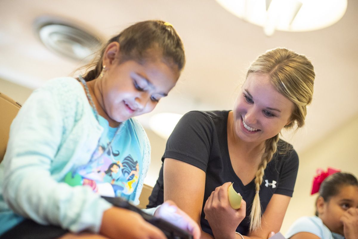 student with child patient