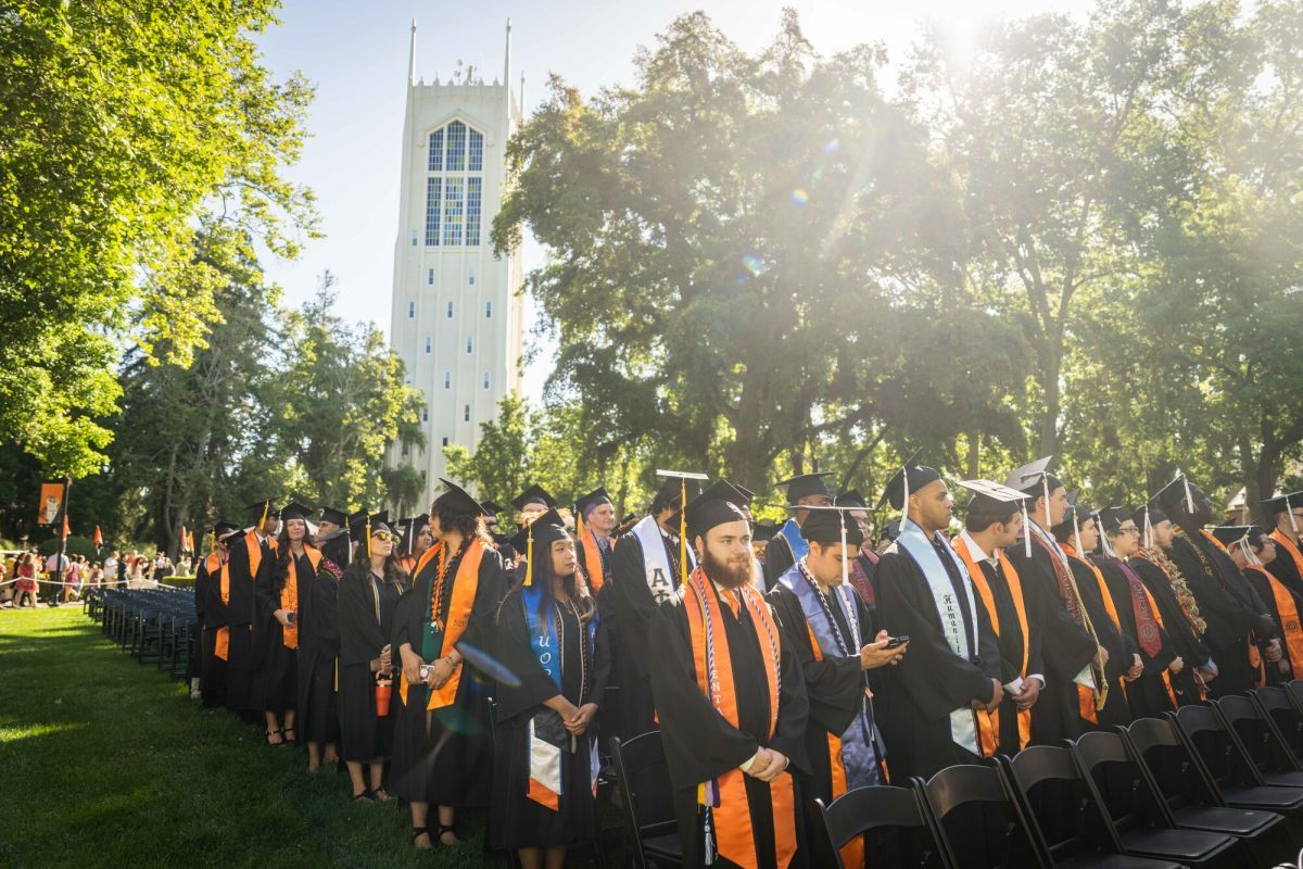 graduates wearing cords at graduation