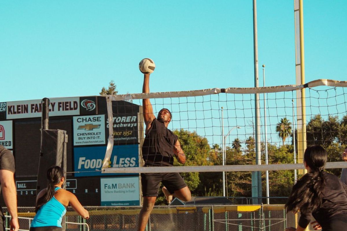 students playing volleyball