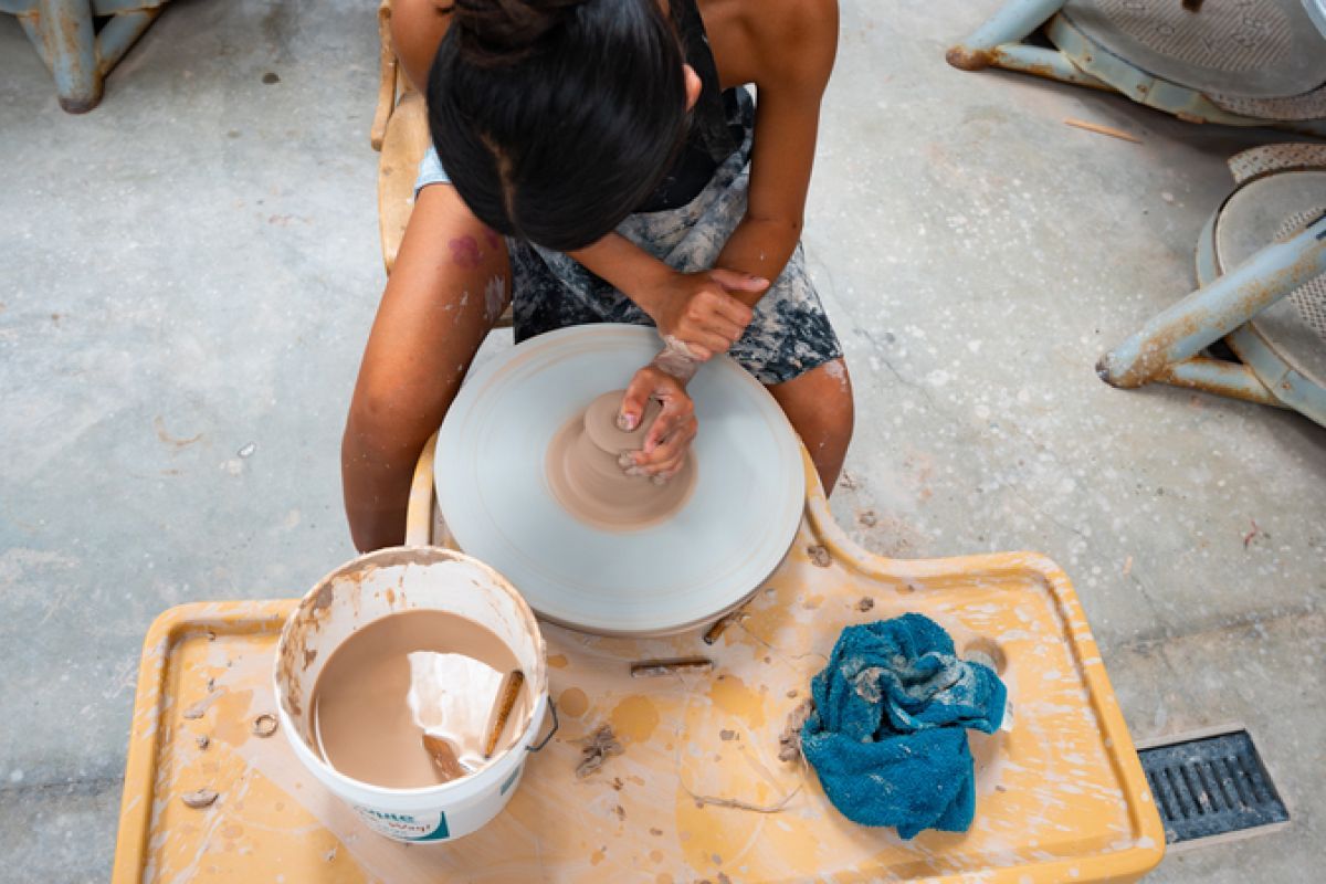 Ceramics students working with clay