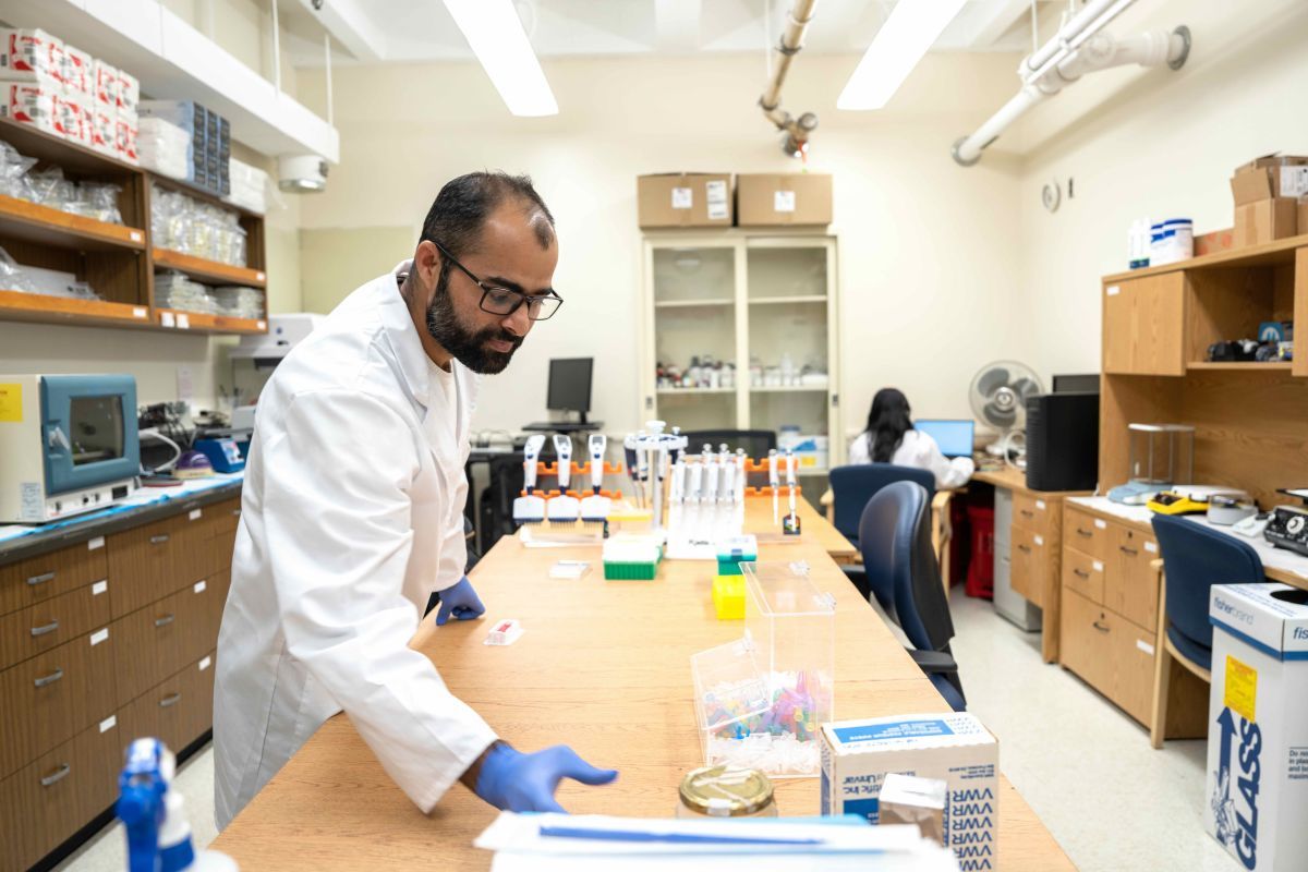 a Pacific professor does research in his lab