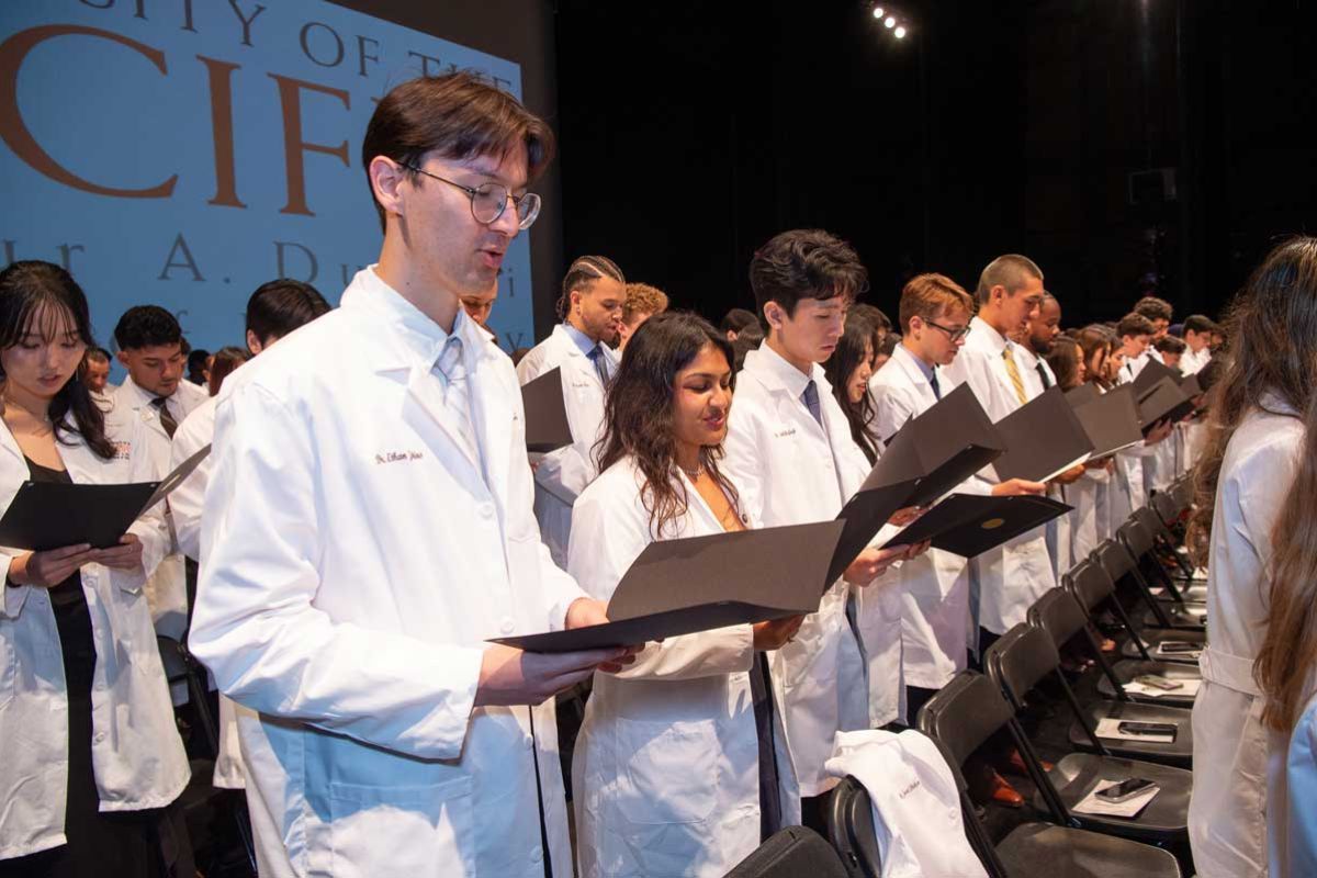 Students reciting oath at White Coat Ceremony