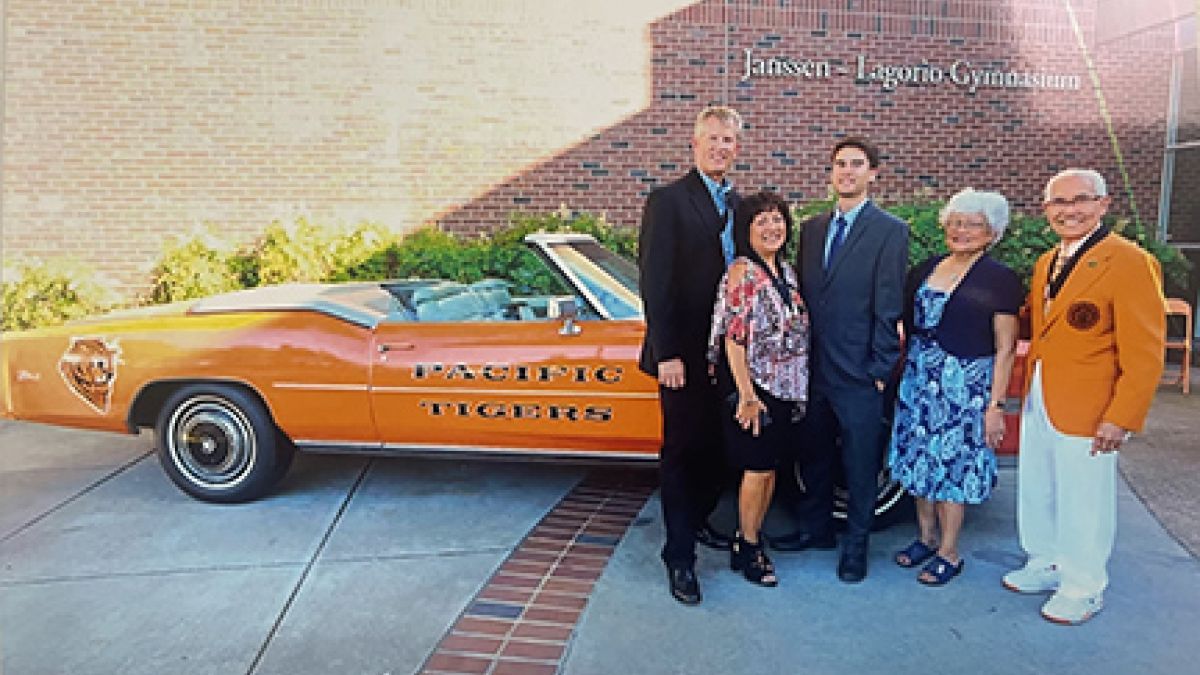 The Berbano Family in front of the Tiger Car