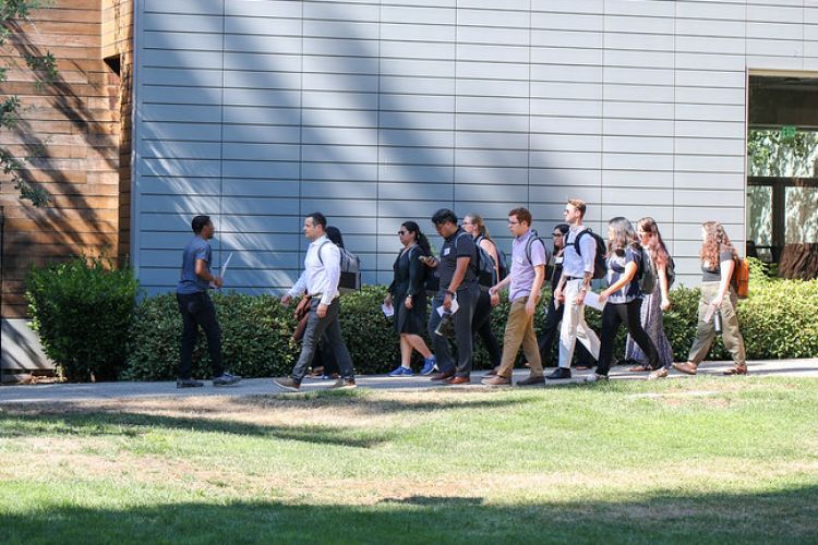 Law students go on a walking tour of campus.