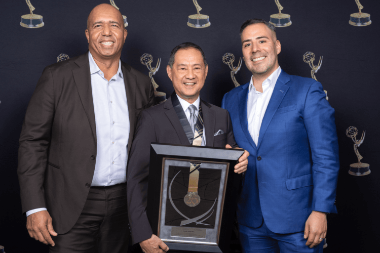 Dale Yurong holding Silver Circle award