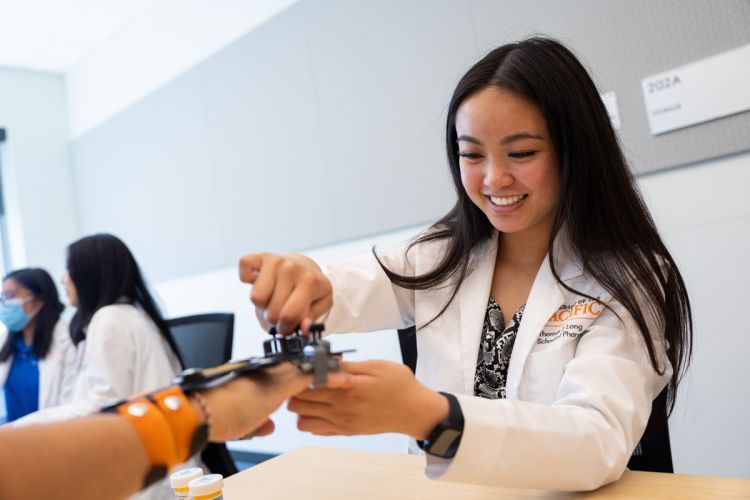 A student works with a patient at a Diabetes Care Clinic