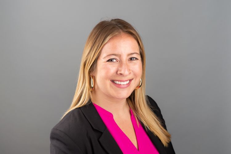 a female wearing business attire.