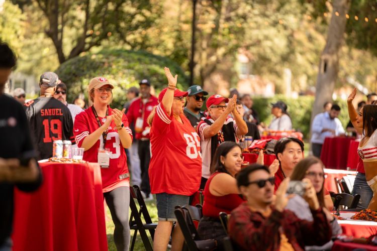 people celebrate at a viewing party