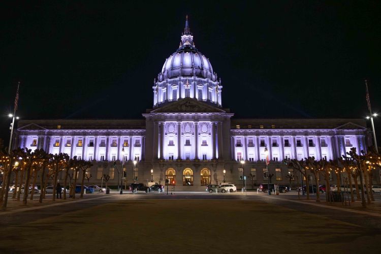 City Hall lit up in purple