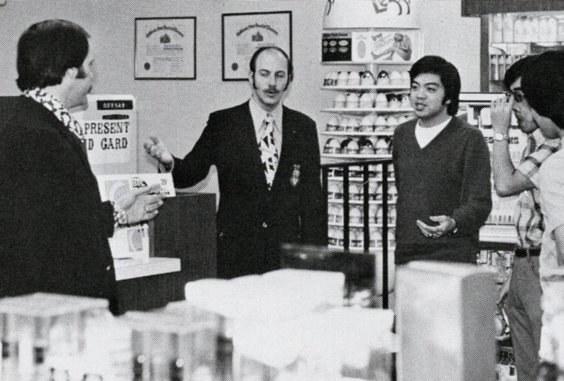 Faculty and students in on-campus pharmacy