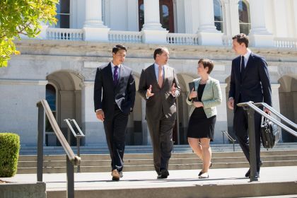 People standing in front of a building.
