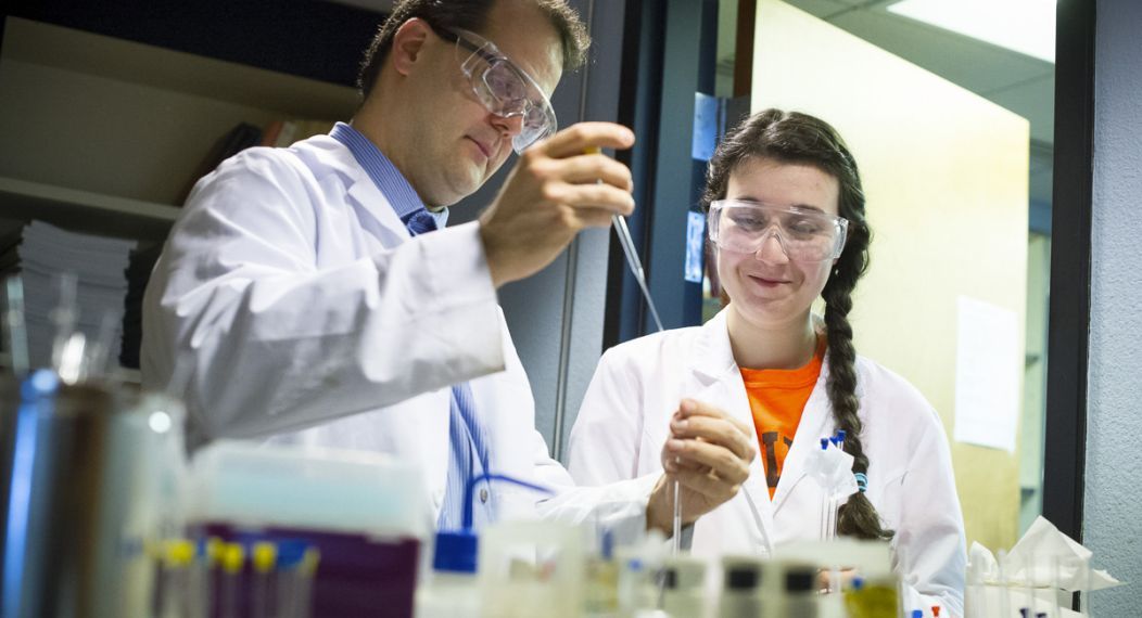 Student and professor in lab