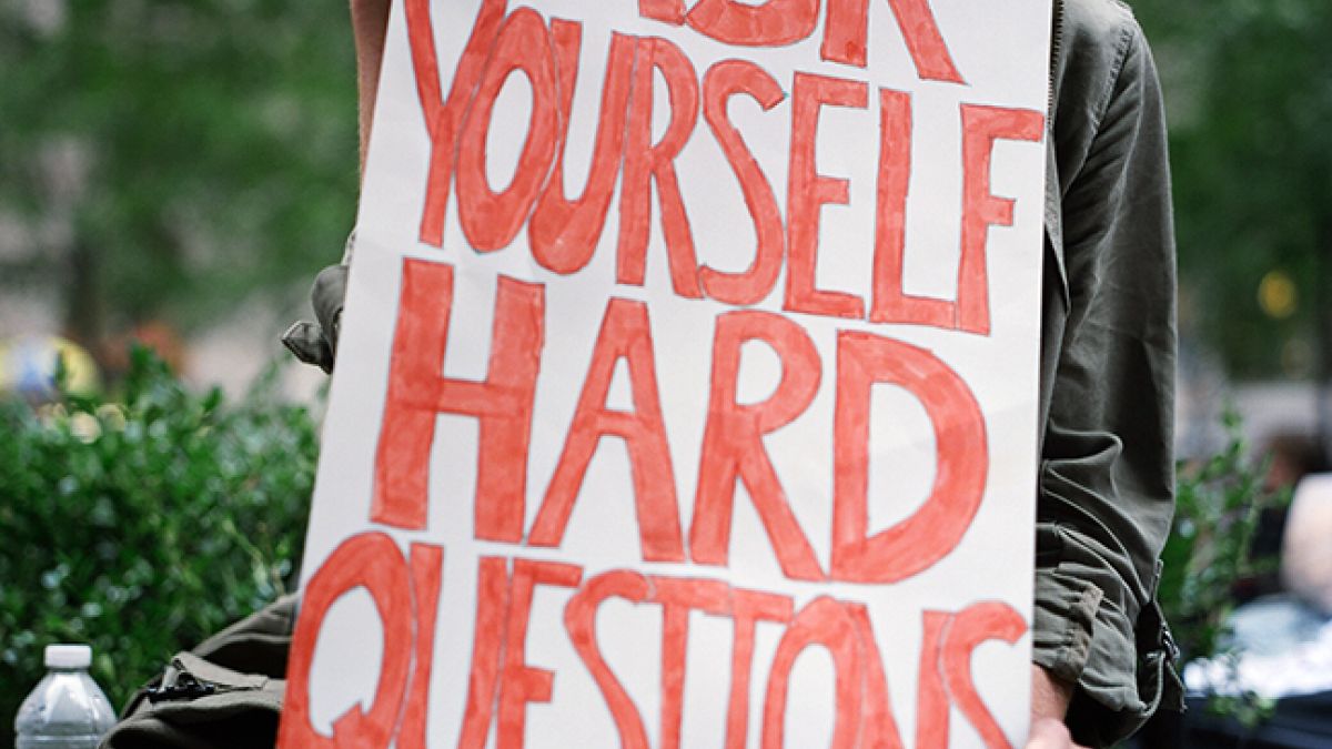 Handpainted sign ask yourself hard questions