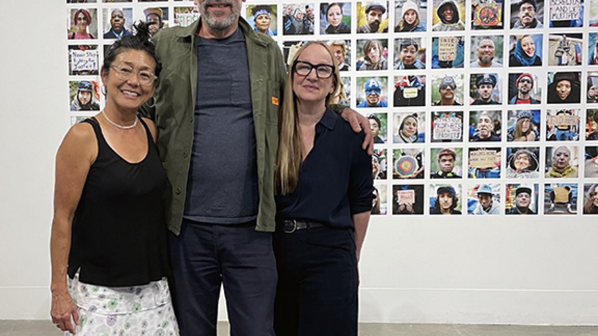 Artist and friends in gallery